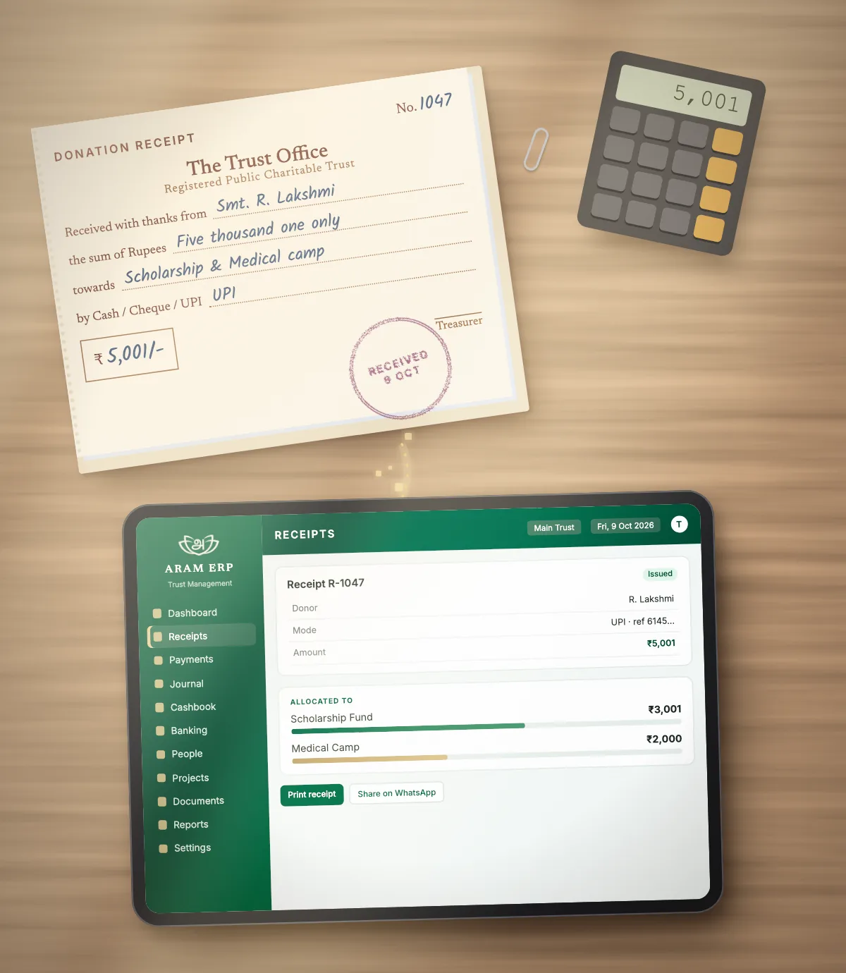 A paper donation receipt book beside a tablet showing the digital receipt in ARAM ERP, with the amount allocated to two funds